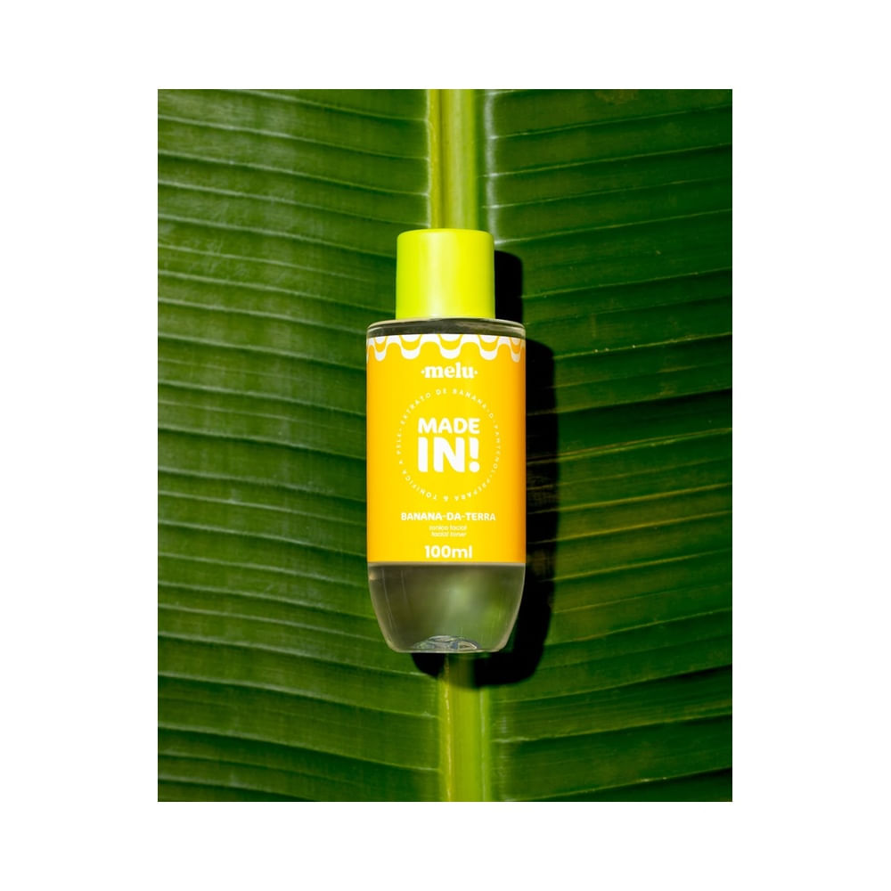Tônico Facial Melu Made In Banana-da-Terra 100ml com rótulo amarelo e verde em fundo branco.